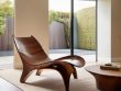 Modern rooms featuring sculptural furniture pieces.
